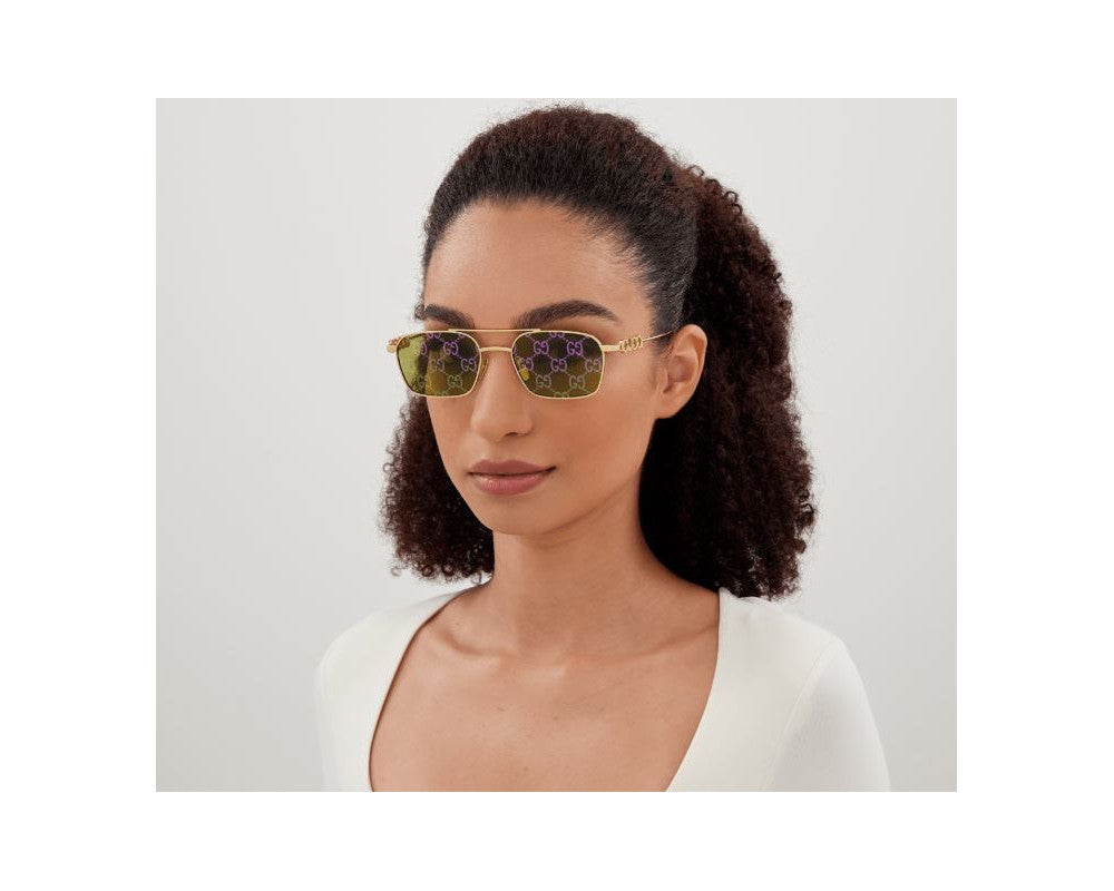 Lunettes de soleil Gucci Lettering GG1804S Doré (001) - vue de face